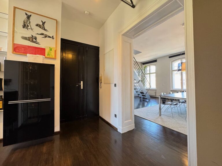 Open-plan living space on the 4th floor of Bergmannkiez maisonette