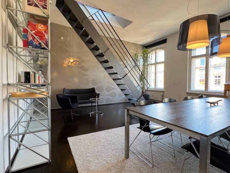 Modern fitted kitchen with central island, Berlin maisonette 4th floor