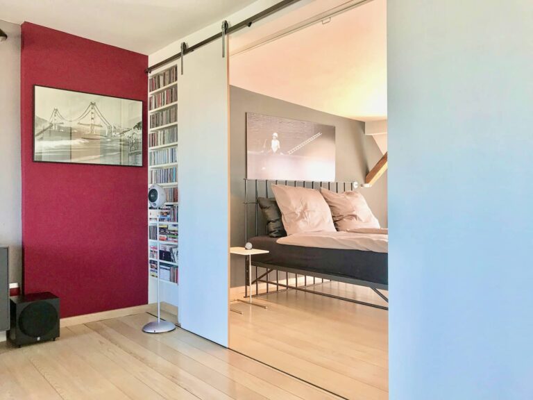 Bedroom on upper floor with pitch pine floorboards, Berlin