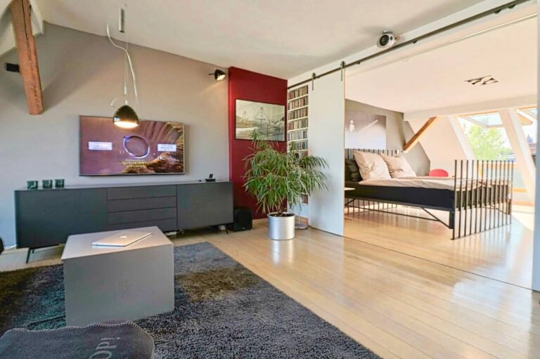 Bedroom on upper floor with pitch pine floorboards, Berlin