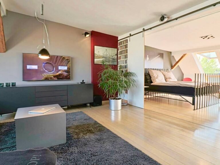 Bedroom on upper floor with pitch pine floorboards, Berlin